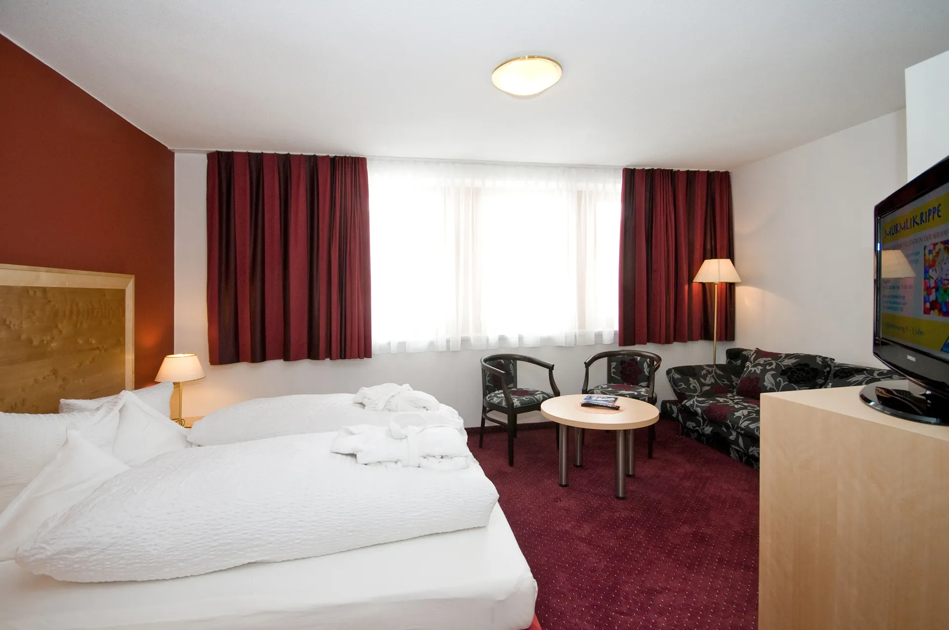 Hotel Amadeus - Tweepersoonskamer met 2 extra bedden mogelijk