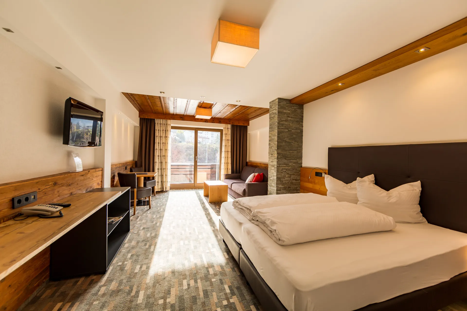 Hotel Mozart Landeck - Comfort tweepersoonskamer met 2 extra bedden