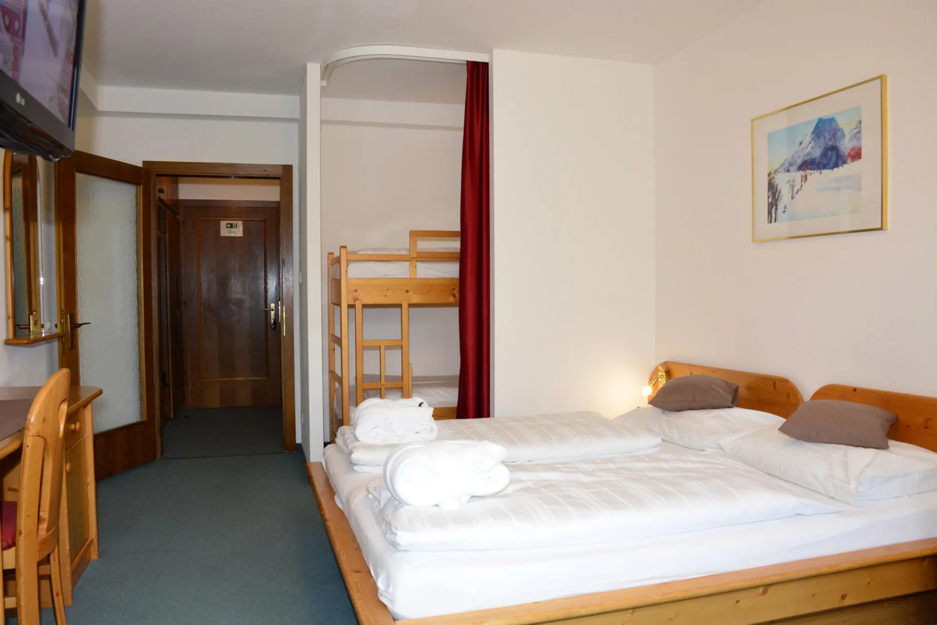 Kinder- und Familienhotel Nockalm - Tweepersoonskamer met 2 extra bedden